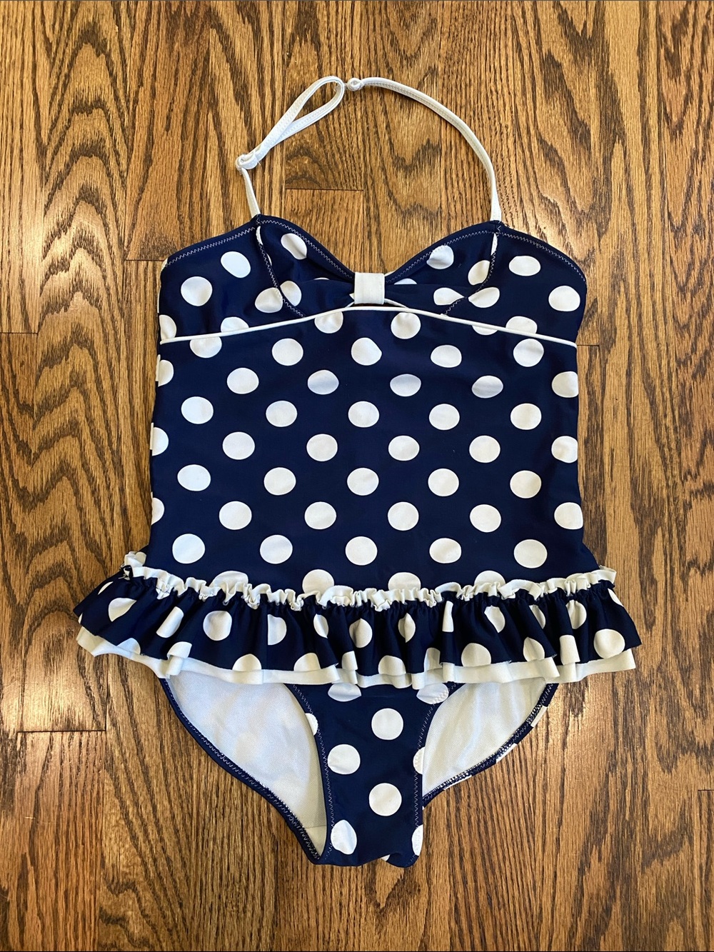Kate Mack navy and white polka dot retro halter girls’ swimsuit, size 10.